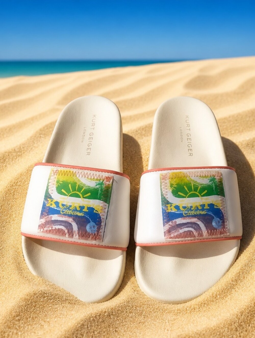 Kurt Geiger White Slide Sandals with Multicolor Embroidered Patch